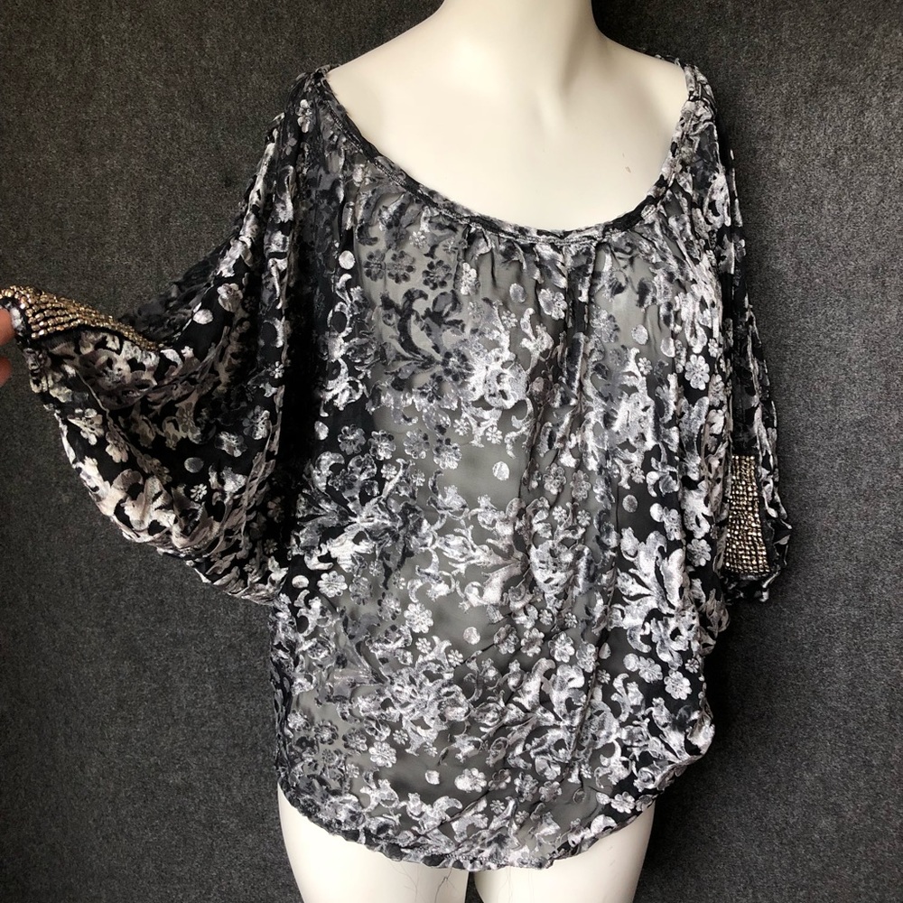 Beautiful sheer blouse with bead detail on sleeve